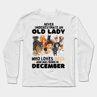 Never Underestimate An Old Lady Who Loves Dogs And Was Born In December Long Sleeve T-Shirt